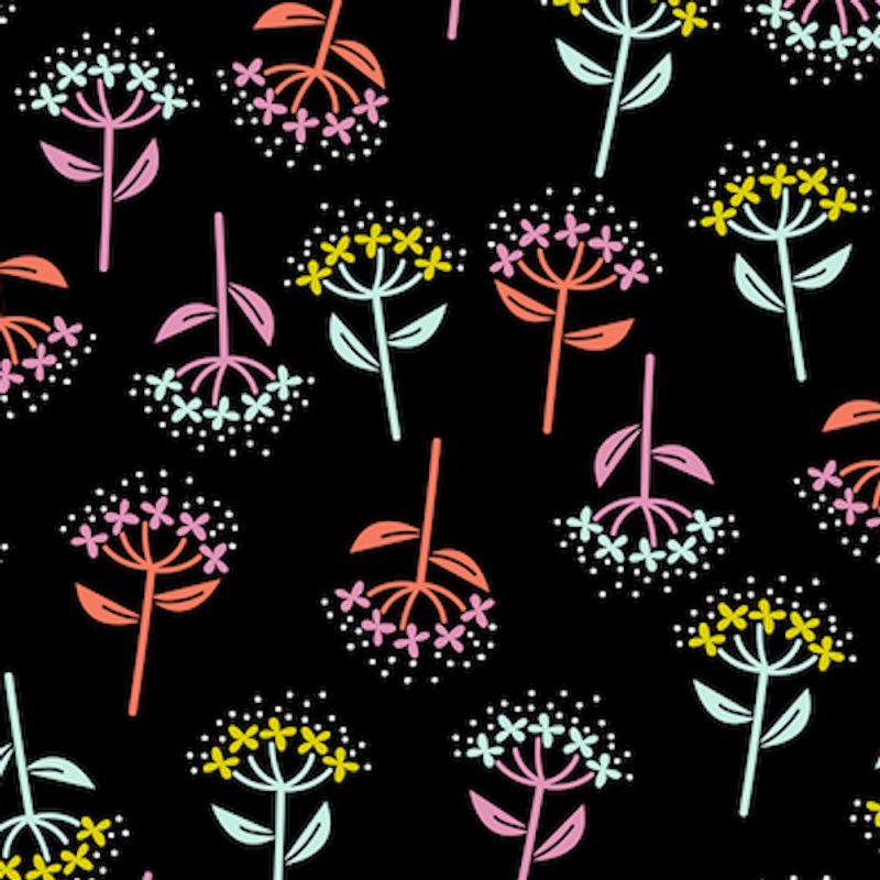Flerfarget blomst på svart